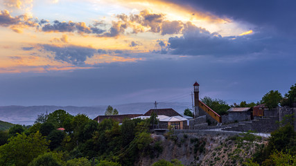 Fototapeta na wymiar View of the old minaret at sunset time
