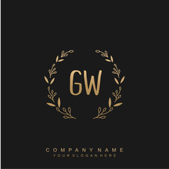letter GW surrounded by beautiful and elegant flowers and leaves. Wedding monogram logo template.