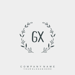 letter GX surrounded by beautiful and elegant flowers and leaves. Wedding monogram logo template.