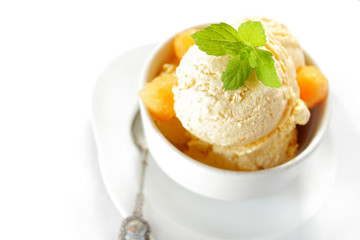 Fresh melon ice cream with melon and melissa isolated on white background 