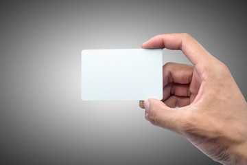 Hand holding card with empty space.