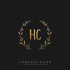 letter HC surrounded by beautiful and elegant flowers and leaves. Wedding monogram logo template. Fashion Logo template Vectors,