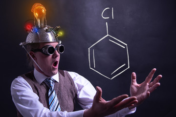 Nerd presenting handdrawn chemical formula of Chlorobenzene