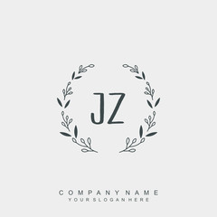 letter JZ surrounded by beautiful and elegant flowers and leaves. Wedding monogram logo template. Fashion Logo template Vectors,