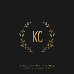 letter KC surrounded by beautiful and elegant flowers and leaves. Wedding monogram logo template.