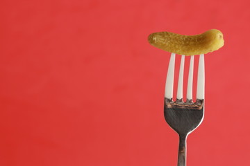 delicious gherkin in colorful background