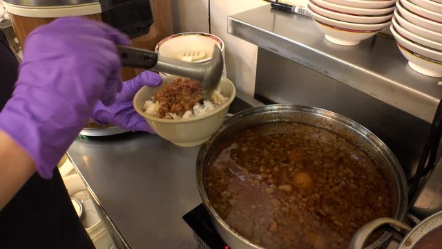 Taiwanese traditional food, LU ROU FAN (MINCED PORK RICE). It is ground pork marinated and boiled in soy sauce served on top of steamed rice. Very popular dish in Taiwan and Southern Fujian in China.
