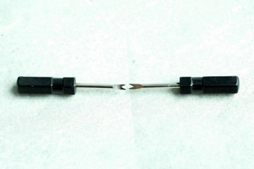 bar and spring removing tool for watch strap and wristband isolated on cement  background