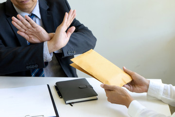 Business man give bribe to the officer