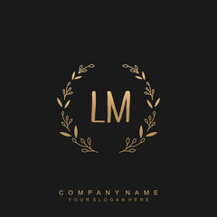 letter LM surrounded by beautiful and elegant flowers and leaves. Wedding monogram logo template.