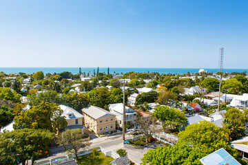 Obraz premium The historic and popular center and Duval Street in downtown Key West. Beautiful small town in Florida, United States of America. With colorful houses.
