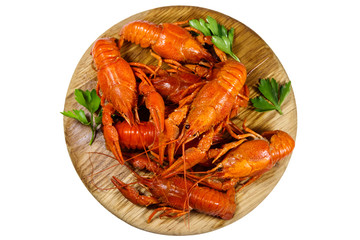 Boiled crayfish on wooden cutting board isolated on white background
