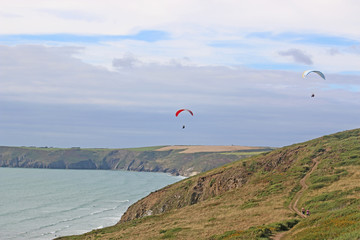 paragliders flying at Newgale, Wales