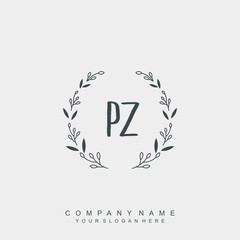 letter PZ surrounded by beautiful and elegant flowers and leaves. Wedding monogram logo template.