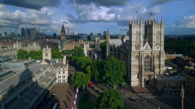 Aerial view of London including Westminster Abbey and Big Ben. Major sights included in this view are Big Ben and Houses of Parliament, the London Eye, Shard, Canary Wharf and the Supreme Court