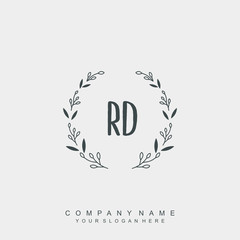 letter RD surrounded by beautiful and elegant flowers and leaves. Wedding monogram logo template.