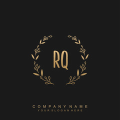 letter RQ surrounded by beautiful and elegant flowers and leaves. Wedding monogram logo template.