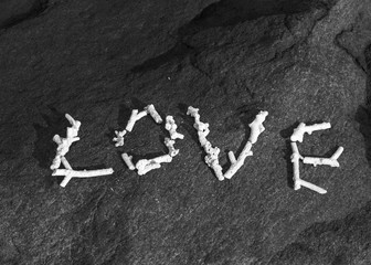 Word love made of coral