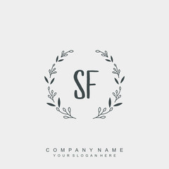 letter SF surrounded by beautiful and elegant flowers and leaves. Wedding monogram logo template.