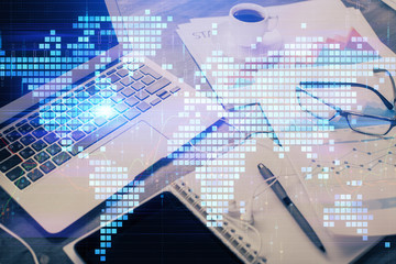 Double exposure of business theme icons and work space with computer background. Concept of success.