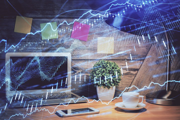 Multi exposure of graph and financial info and work space with computer background. Concept of...