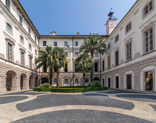 The courtyard of Palazzo Borromeo on Isola Bella, Stresa, Italy, on a sunny day