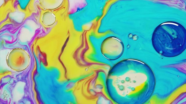 Top view to beautiful combination of paint and ink in milk and oil. Fantastic structure of colorful bubbles. Abstract colorful paint. Good idea for mobile phone home screen style, themes or wallpaper