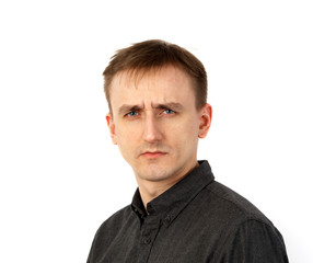 Fototapeta premium Young male portrait listening carefully to something