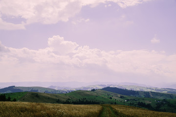 Obraz premium Romantik landscape in the mountain village in the Hutsul region Dovhopillya