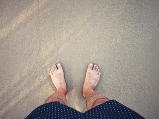 feet on the beach