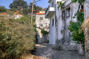 A narrow street in an old mountain village. Greece. Crete