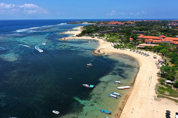 Beautiful resorts with white sand beach, Tanjung Benoa, Bali, popular for water sports activities.