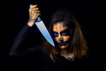 portrait of a woman dressed as halloween pumpkin