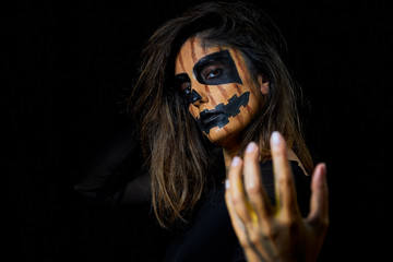 portrait of a woman dressed as halloween pumpkin