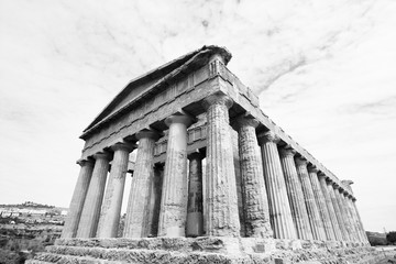Ancient temple in Agrigento, Italy. Black and white retro style.