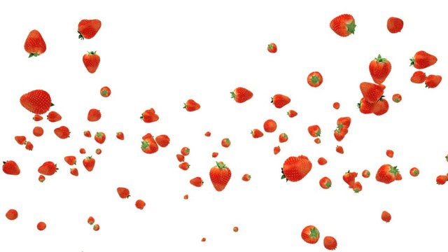 Fresh strawberries flying in slow motion against white