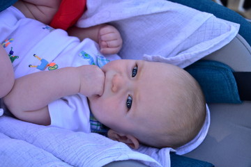 Newborn baby. Blonde boy with blue eyes, ten weeks.