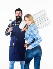 Perfect summer lunch. Tools for roasting meat. Man bearded hipster and girl. Preparation and culinary. Family weekend. Couple in love hold kitchen utensils. Picnic & barbecue. food cooking recipe