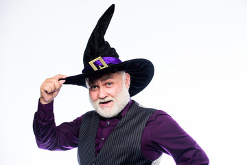 Senior man white beard celebrate Halloween. Magician witcher old man. Magic concept. Experienced...