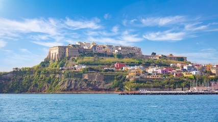 Fototapeta premium View from sea to rocky coast of island of Procida, southern Italy.