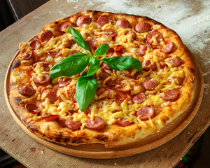 pizza with sausages (tomato sauce, cheese). food background. top view. copy space