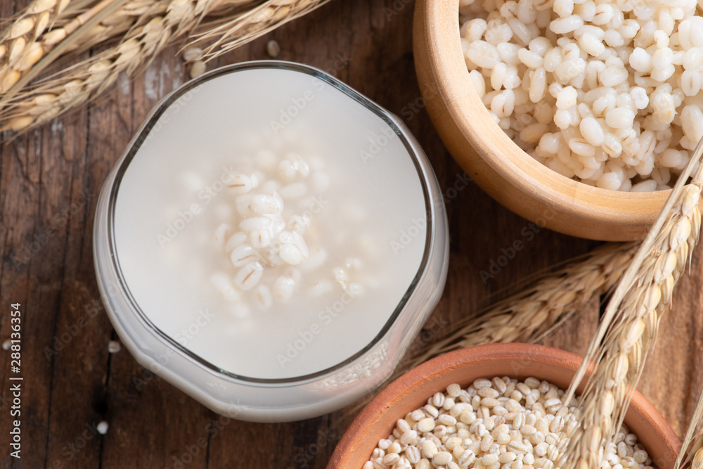 Canvas Prints Barley water in glass with raw and cooked