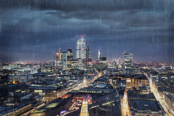 Dark clouds and rain over the City of London, financial hub of United Kingdom