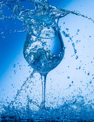 glass, wine, drink, water, alcohol, wineglass, blue, isolated, empty, white, liquid, transparent, clear, beverage, clean, object, crystal, goblet, reflection, drop, bar, single, fresh, cold, celebrati