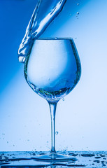 glass, wine, drink, water, alcohol, wineglass, blue, isolated, empty, white, liquid, transparent, clear, beverage, clean, object, crystal, goblet, reflection, drop, bar, single, fresh, cold, celebrati