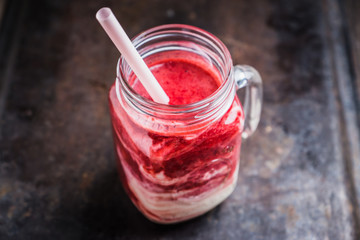 Healthy cherry smoothie with yogurt in jar. Selective focus. Shallow depth of field.