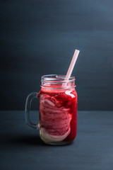 Healthy cherry smoothie with yogurt in jar. Selective focus. Shallow depth of field.