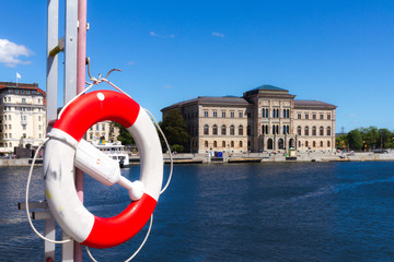 Obraz premium Life buoy in front of the Nationalmuseum of Stockholm