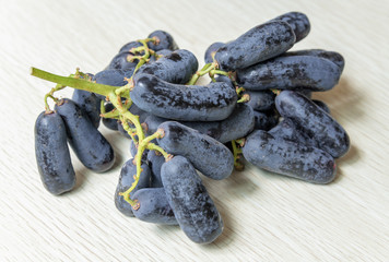 A bunch of ripe gold-fingered hetty grapes