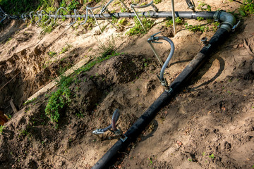 pumping station. groundwater drainage system pumps water out of the ground. dehydration gravel rural route